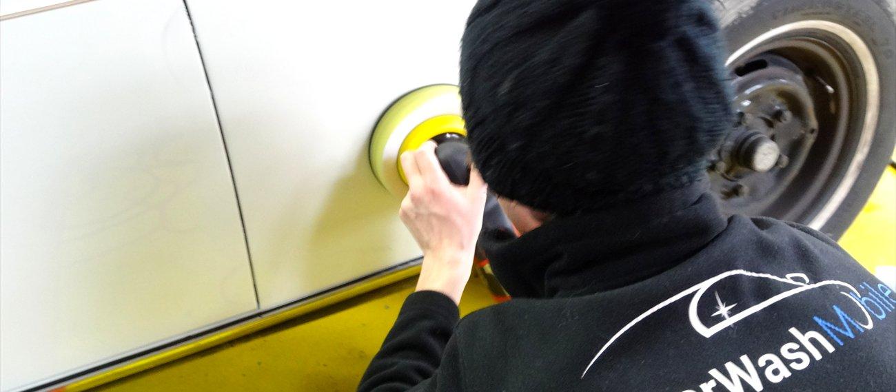 My CarWash Mobile technician polishing a body panel